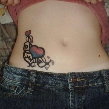 Tatouage ventre femme : 50+ idées de tatouages et leurs significations 36