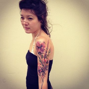 Tatouage bras femme : 50+ idées de tatouages et leur signification 338